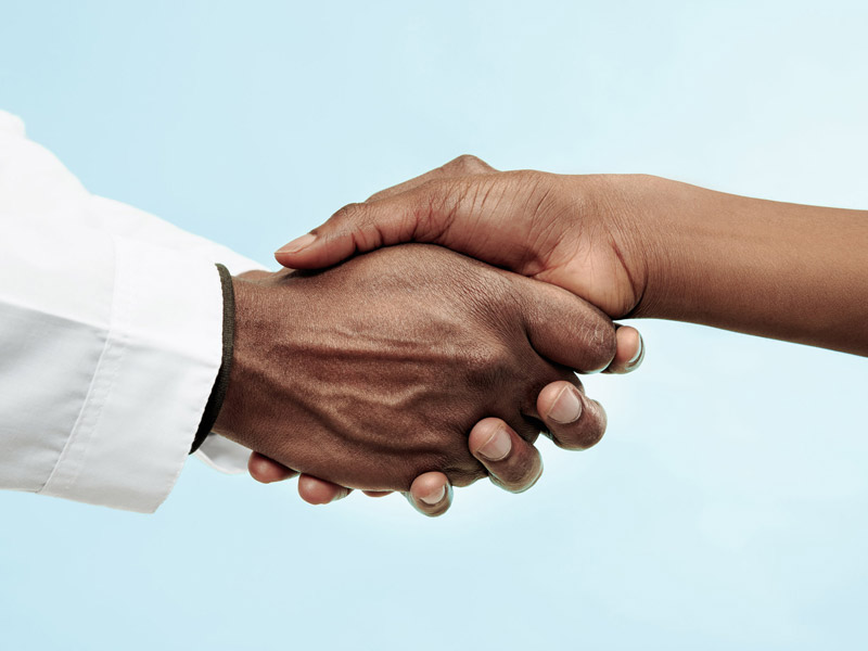 physicians shaking hands