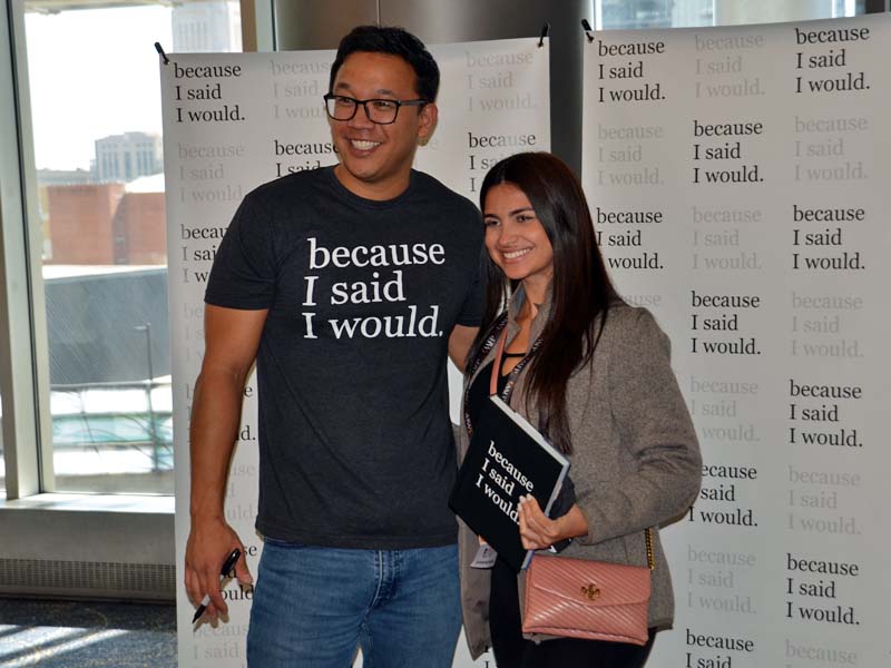 Thalia Vega, M.D., stops for a photo with Main Stage speaker Alex Sheen at the 2024 National Conference of Family Medicine Residents and Medical Students.